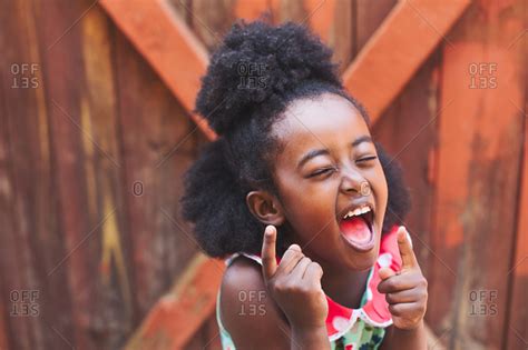 Little girl laughing - from the Offset Collection stock photo - OFFSET