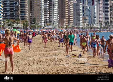 Benidorm, Spain. 6th November, 2015. Packed beaches in the hot Stock Photo, Royalty Free Image ...