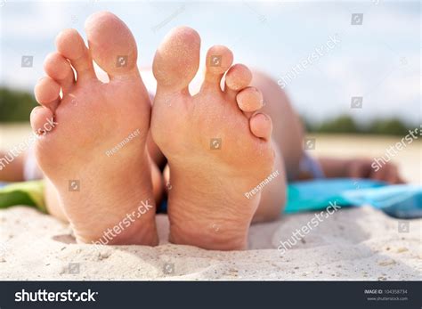 Closeup Female Lying On Beach Barefoot Stock Photo 104358734 | Shutterstock