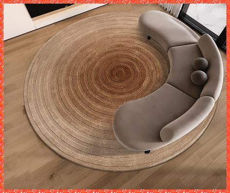 a living room with a round rug on the floor