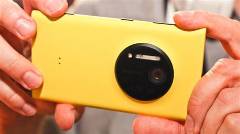 Nokia's 'camera expert' ditches Microsoft for Apple - CNET