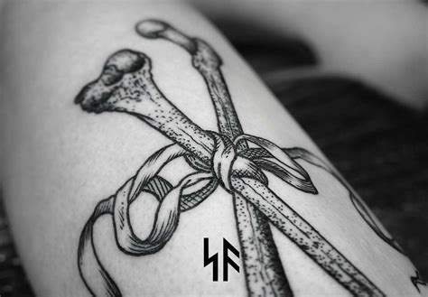 Tied bones tattoo - Tattoogrid.net