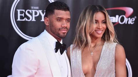 While on honeymoon, Russell Wilson and wife Ciara help save rhinos ...