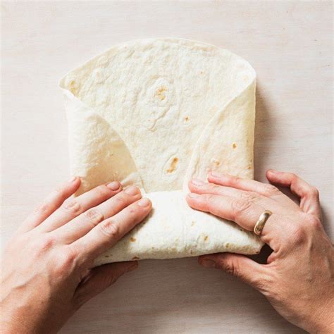 We Found the Foolproof Way to Fold a Wrap | Tortilla wraps, Wrap recipes, Lunch wraps