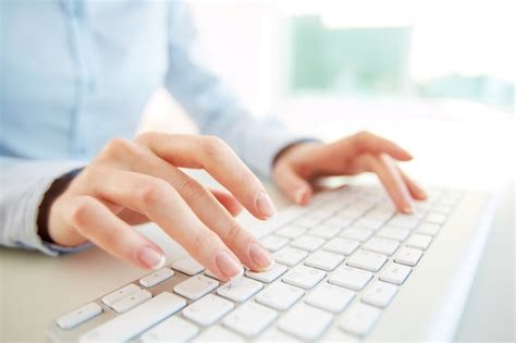 Free Photo | Close-up of employee with computer keyboard