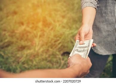 Close Hands Giving Money Bribe Payment Stock Photo 2207020729 ...