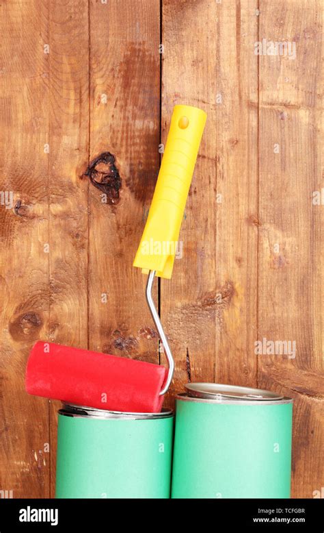 Painting wooden fence Stock Photo - Alamy