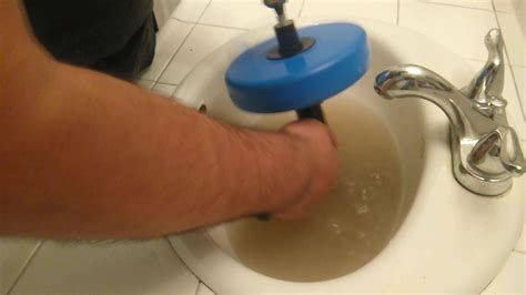 How to clear clogged drain - YouTube