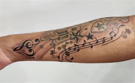 56 Melodiously Meaningful Music Note Tattoo Ideas for 2024!