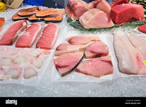 Salmon and tuna fillet for sale at a fish market Stock Photo - Alamy