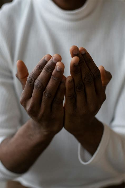 Crop black man showing pray gesture · Free Stock Photo
