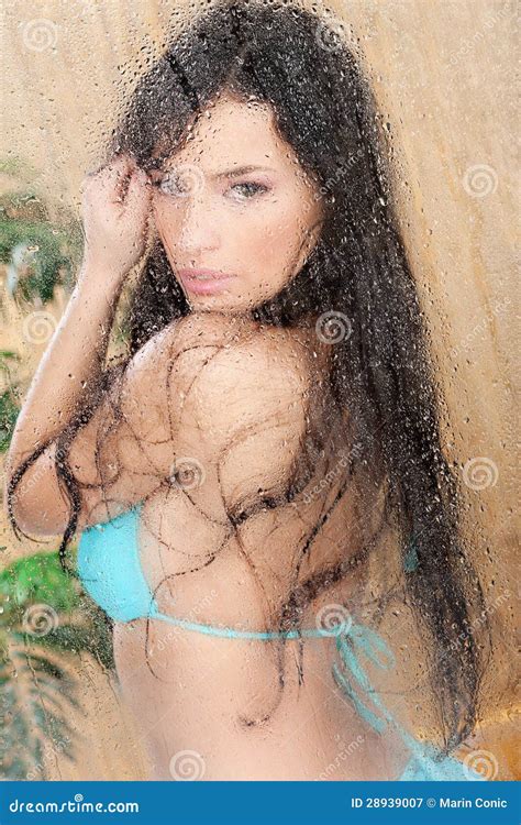 Woman in Bikini Behind Glass Stock Image - Image of glass, young: 28939007