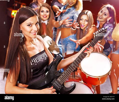 Musical group playing in night club Stock Photo - Alamy