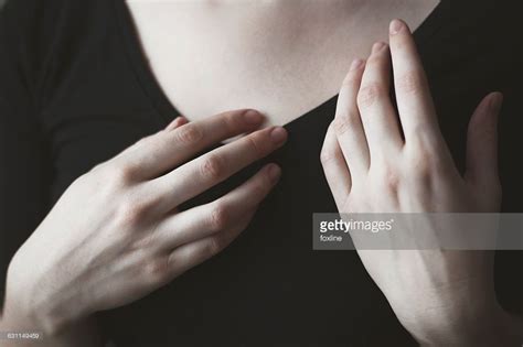 Close-up of woman's hands in front of her chest | Hands on face, Hand reference, Hand drawing ...