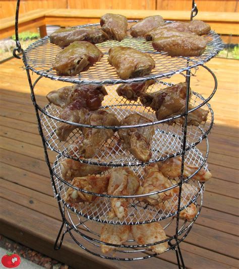 there are many donuts that are on the rack outside by the deck and in ...