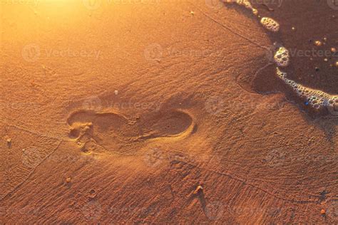 footprints in the sand on the beach at sunset 6059648 Stock Photo at ...