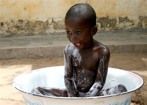 Africa | People. Yeah it's bath time .... Photo taken in Senegal. | Africa people, Africa ...