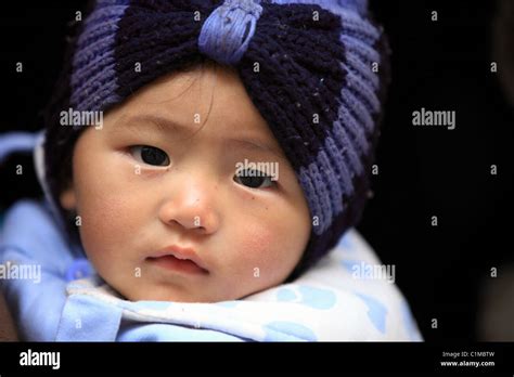 Nepal baby hi-res stock photography and images - Alamy