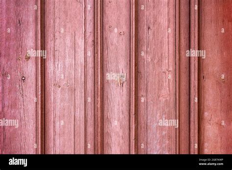 Red wood planks or fence texture background or backdrop with old paint ...