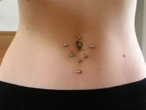 Belly Button Piercing Aftercare and Infected Navel Piercing Symptoms