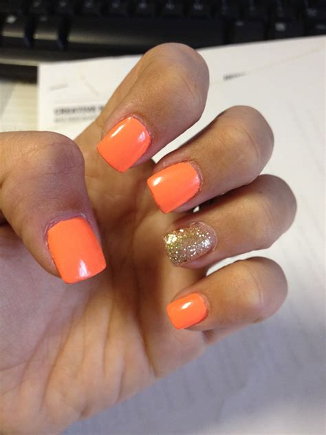 Neon Orange and Gold Glitter Gel Nails
