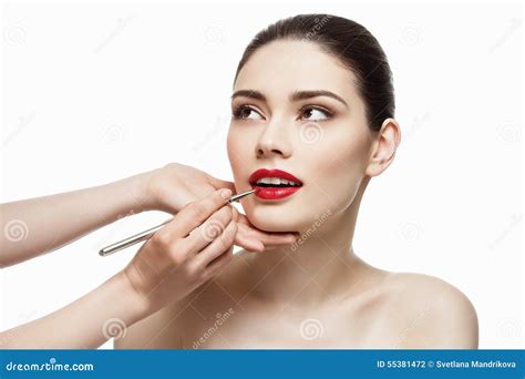 Red lipstick application stock photo. Image of hand, glossy - 55381472