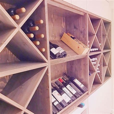 a wine rack filled with lots of bottles