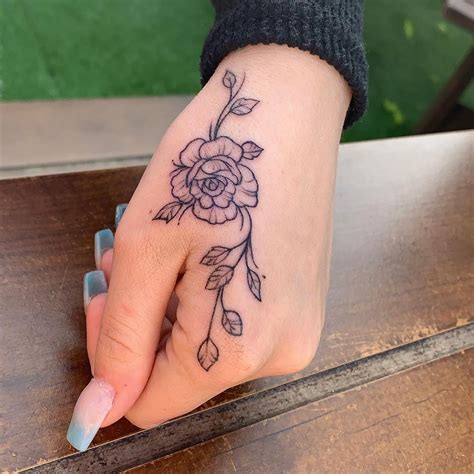 Top 177+ Rose hand tattoo female - Monersathe.com
