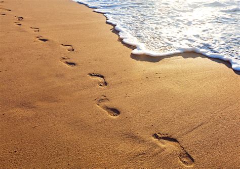 Sand Footprints In The Background