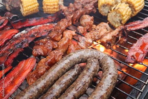 South African braai with meat on the grill. Boerewors, chops, chicken ...