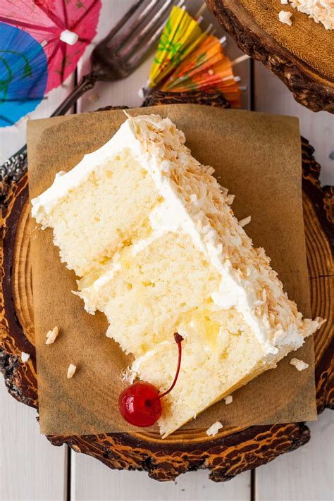 This Pina Colada Cake turns your favourite tropical cocktail into one delicious dessert ...