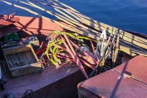 Several Anchors, Ropes and Fishing Gear in a Boat for Freshwater Fish Production Stock Image ...