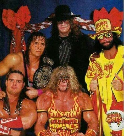 the wwf wrestlers are posing for a photo