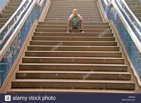 Sad Lonely Boy Sitting On High Resolution Stock Photography and Images - Alamy