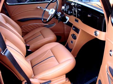 the interior of an old car with tan leather and black trims, including ...