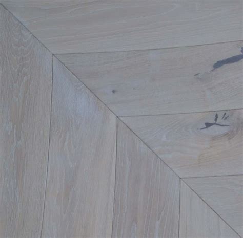 COTTON WHITE oak chevron parquet engineered wood flooring.