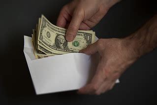 Mailing Money - Payments | Putting money in an envelope to p… | Flickr