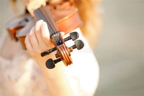 Female Hand with a Violin Outdoor Stock Image - Image of musician, playing: 34662127