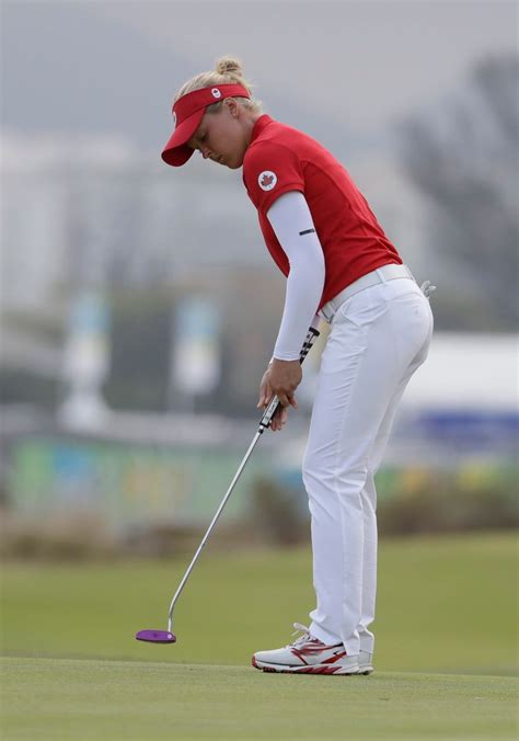 Brooke M. Henderson of Canada, makes putt on the 18th hole during the second round of the women ...