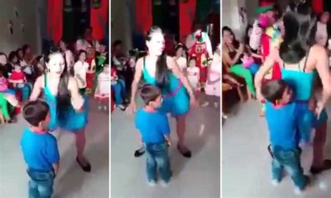 Entertainers force two little boys to hold them as they TWERK in Peru ...