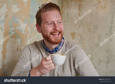 Young Man Drinking Coffee While Working Stock Photo 1040443771 | Shutterstock