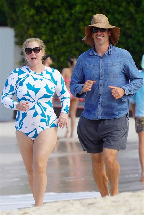 Amy Schumer, Husband Chris Fischer Visit St. Barts Beach: Photos | Us Weekly