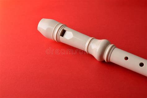 Detail of White Plastic Recorder Mouthpiece on Red Gradient Background Stock Image - Image of ...