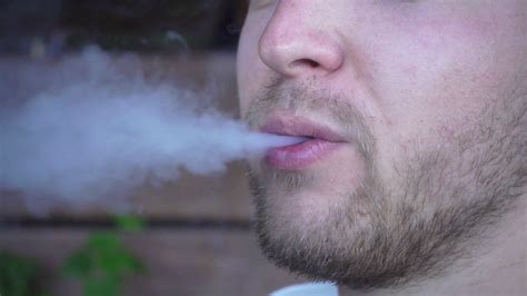 Close-up Of Bearded Man Exhaling Smoke From Stock Footage SBV-319893376 ...