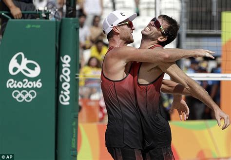 Canadian beach volleyball duo perform the world's worst chest bump | Daily Mail Online