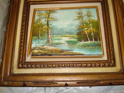 TWO OIL PAINTINGS ON CANVAS FRAMED SIGNED P WONG