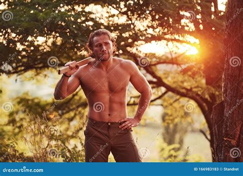 In Woods. Handsome Shirtless Man with Muscular Body Type is in the Forest at Daytime Stock Image ...