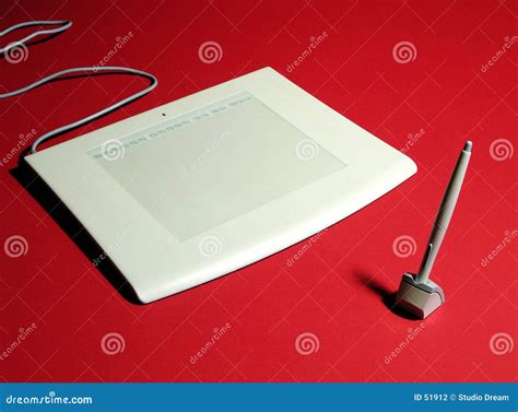 Graphic Tablet With A Pen On A Gray Background, The Work Of A Designer ...