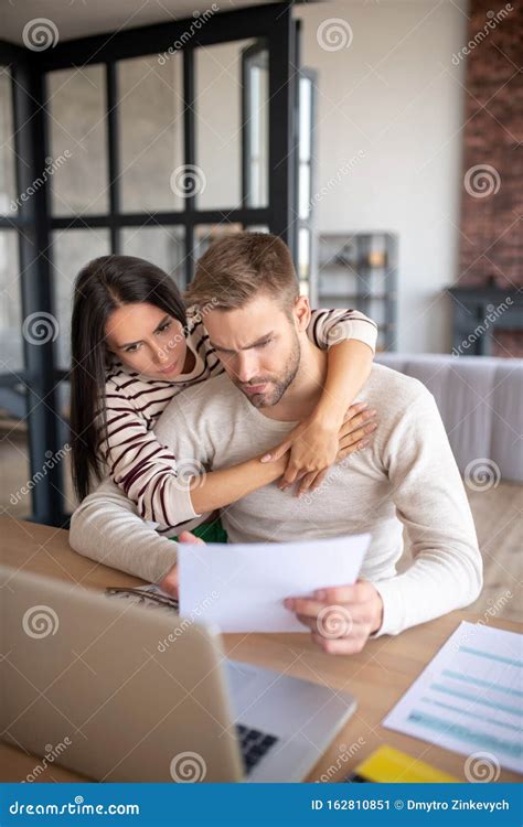 Wife Hugging Husband Having Some Difficulties with Business Stock Image ...