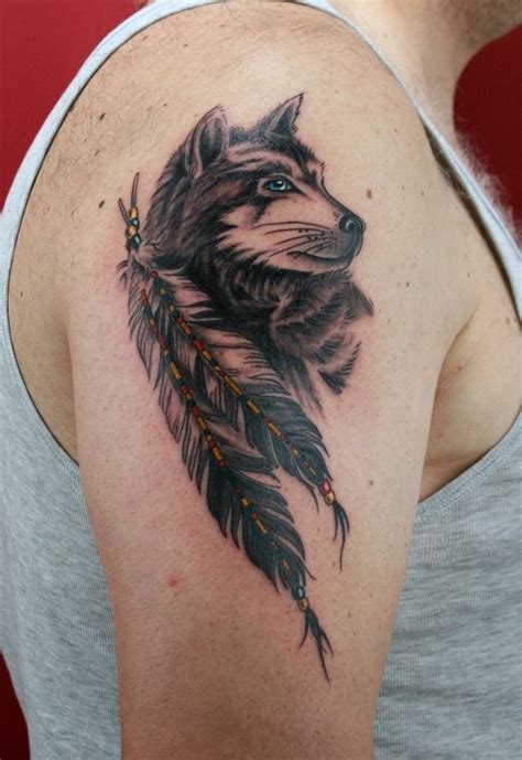 American Indian native wolf and bunch of feather slightly colored shoulder tattoo - Tattooimages.biz